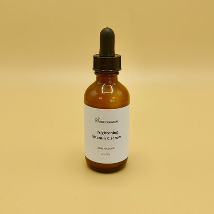 Natural Vitamin C serum is yellow colour in glass Amber Dropper Bottle.